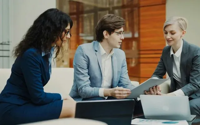Recruiters presenting a candidate shortlist to a client